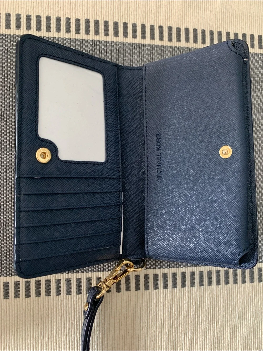 Vintage {Michael Kors} Navy Patent Wristlet with Gold Logo